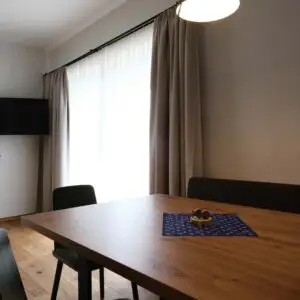 Esszimmer der Ferienwohnung Seeblick im Seehotel Kärntnerhof am Weissensee.